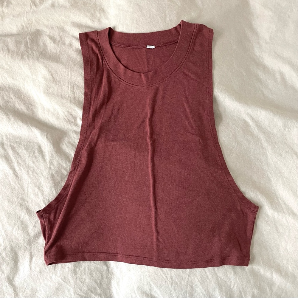alo yoga cropped muscle tank in rust red